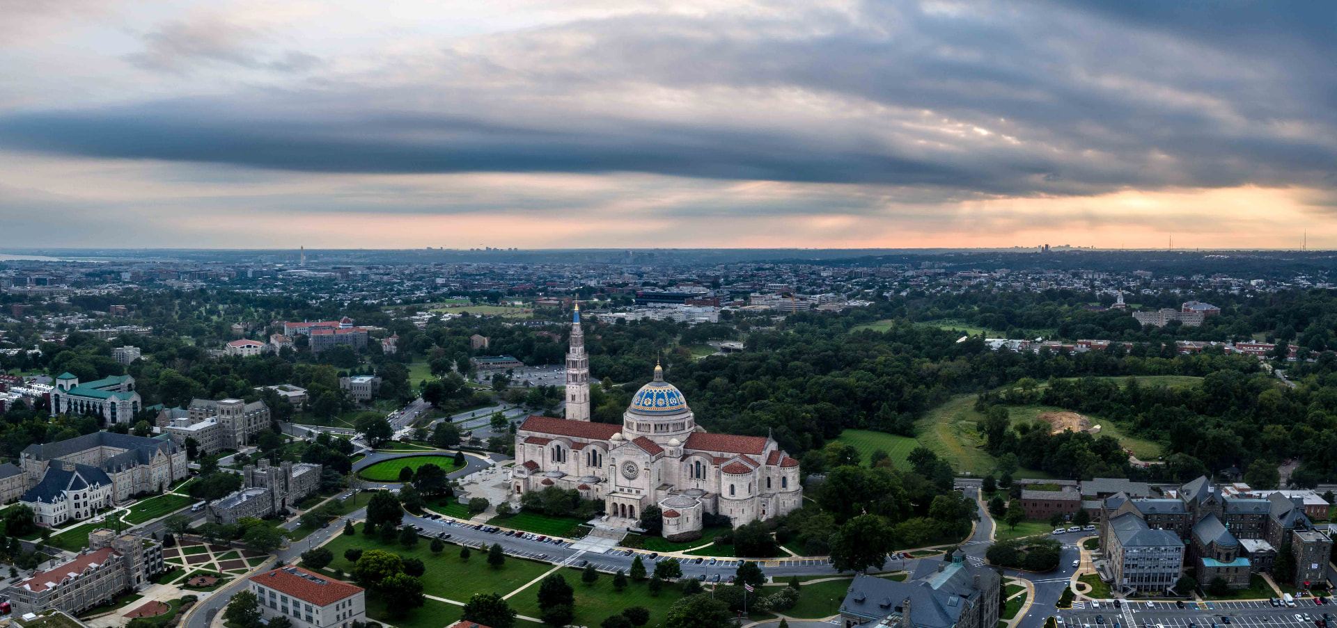 Aerial view of the Basilica of the National Shrine of the Immaculate Conception in Washington, DC at sunset