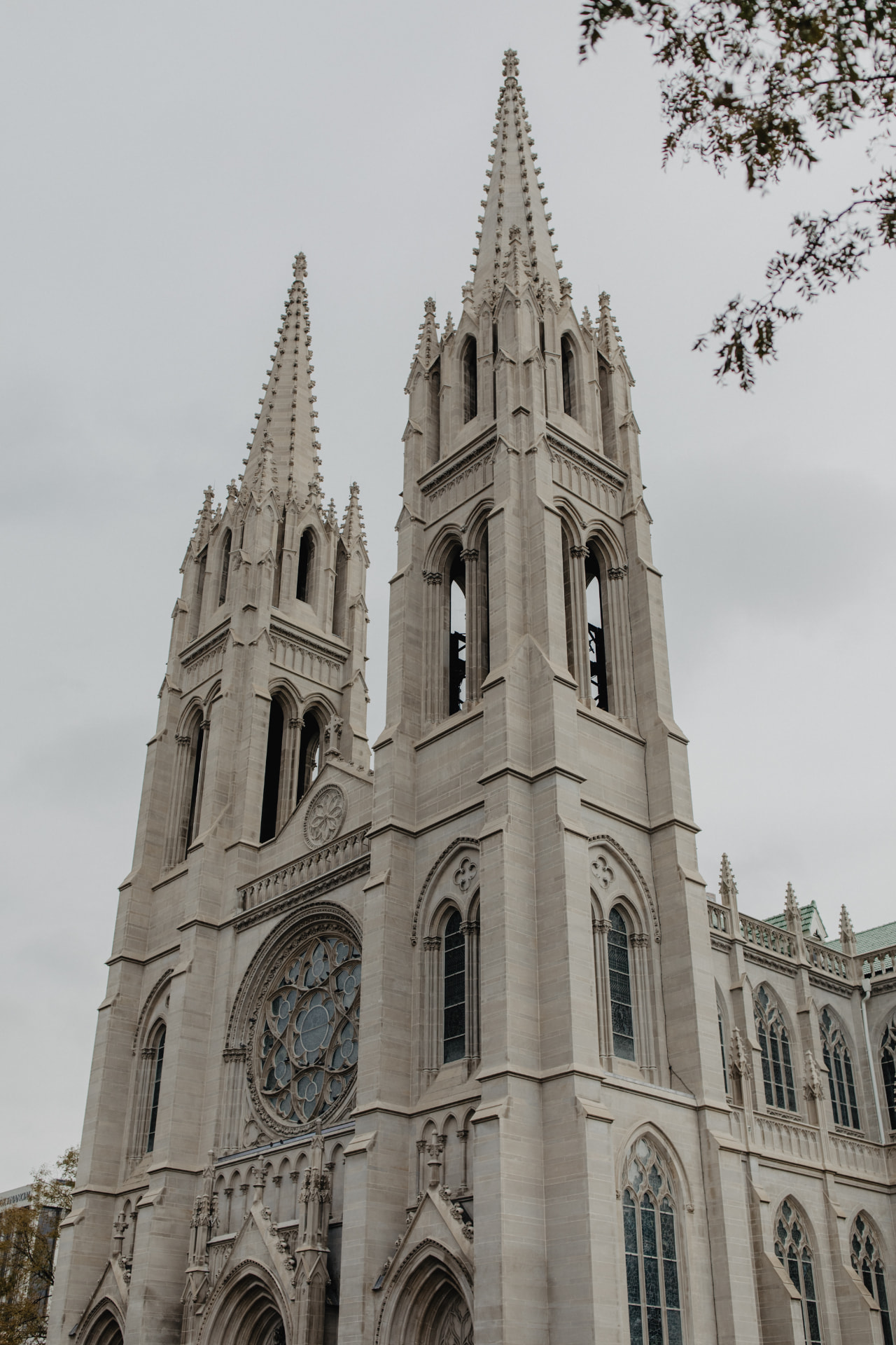 Exterior facade and twin spires of the Cathedral Basilica of the Immaculate Conception in Denver, Colorado