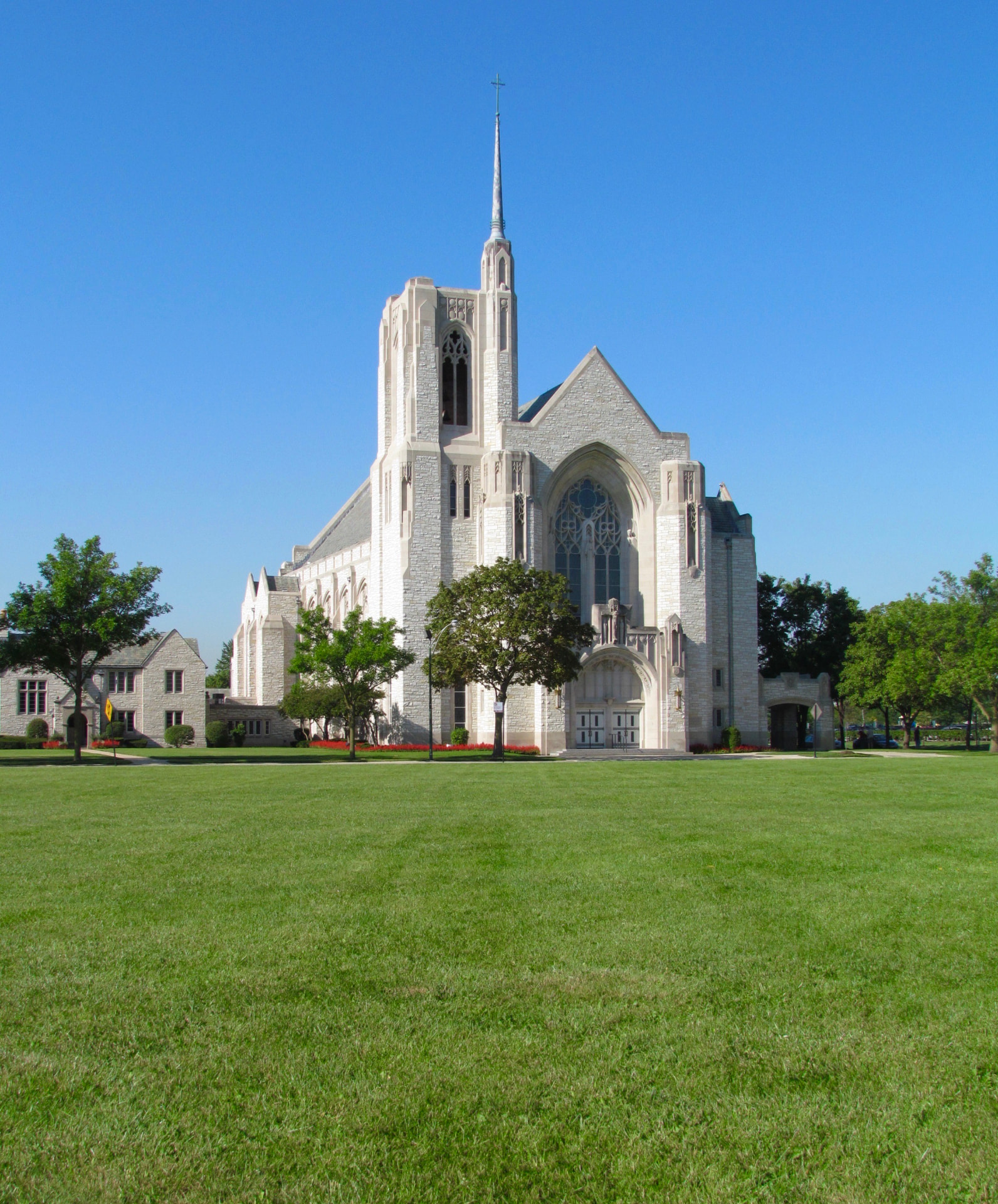Exterior facade and tower of Queen of All Saints Basilica in Chicago, Illinois