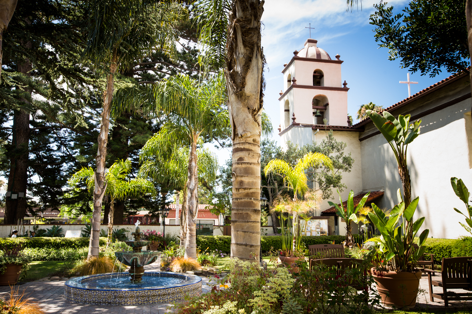 Bell tower and garden courtyard of Mission Basilica San Buenaventura in Ventura, California