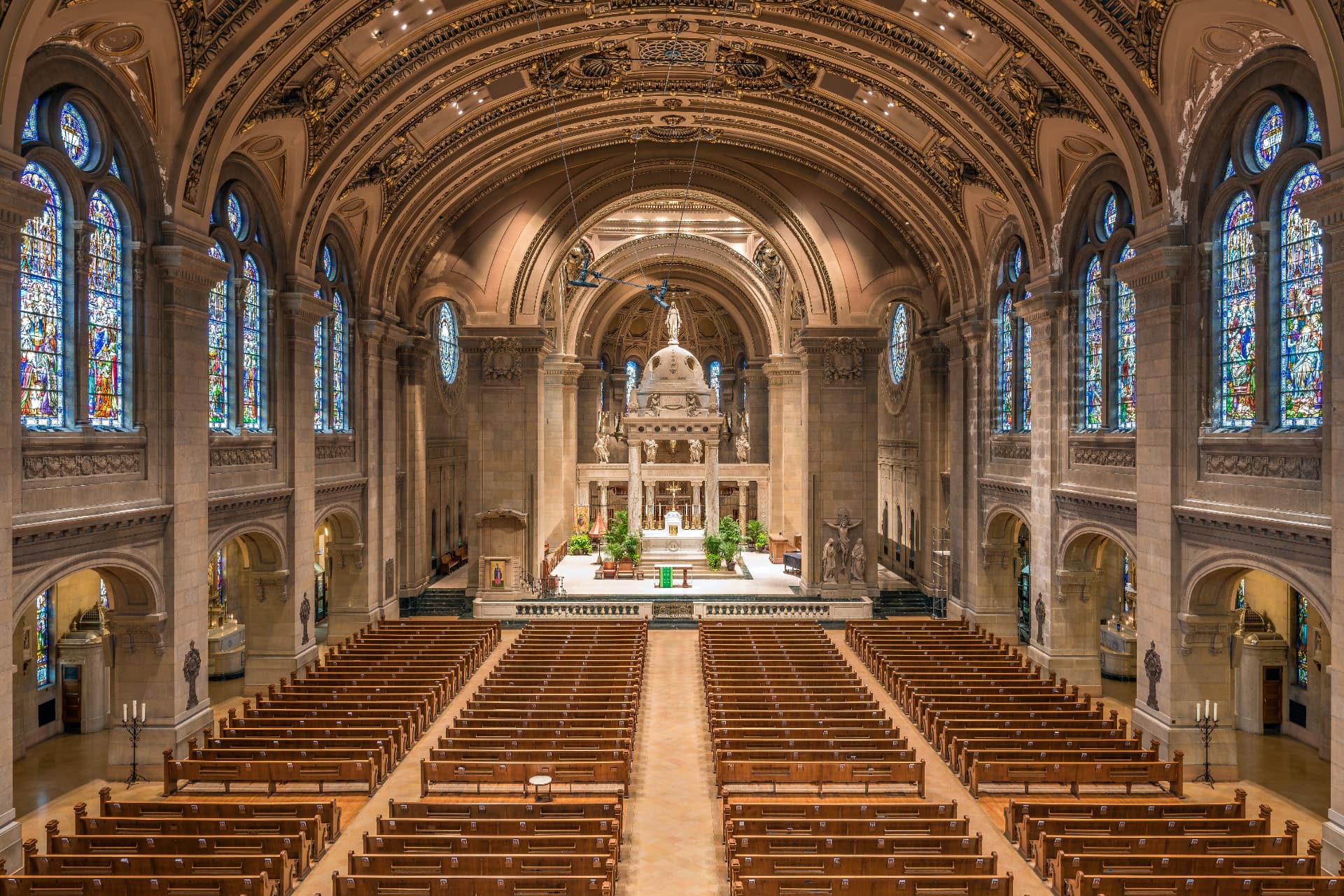 Interior sanctuary and stained glass windows of the Basilica of Saint Mary in Minneapolis, Minnesota